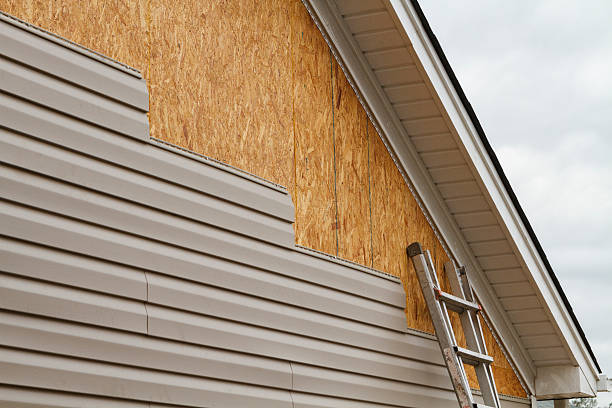 Professional Siding Contractor technician working in Andover, OH